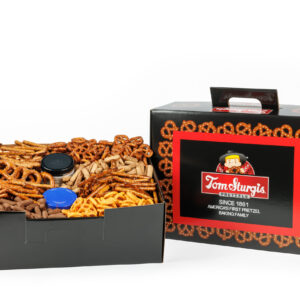 Black and red tote box with pretzels and a jar.